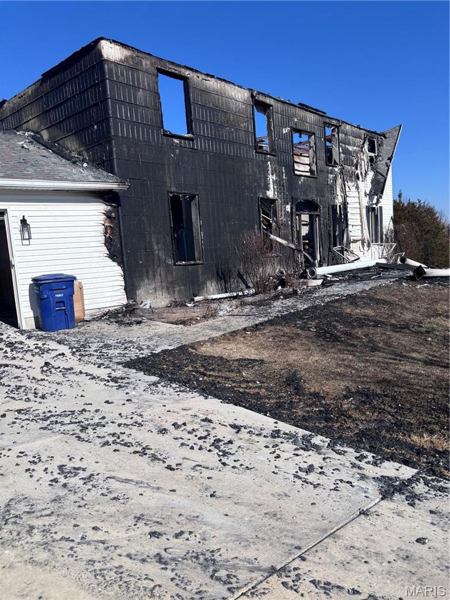 BACK TO MARKET- Buyer didn't hold up their end of the deal! This property is a fire house it has major damage. This is a AS-IS property. Accessing this property could be dangerous therefor the owners will not be held liable if any injuries occur while on the property. Now for the details. Currently still in tact-2000 gallon septic system ( clean inspection as of october 2025), well, inground salt water pool with concrete decking, pool cover, pool thermal cover (pool and systems have no fire damage), 5 gently rolling acres. this property is a corner lot with a nice yard and some woods. Again this is a AS-IS property and owner will not be held liable if injuries occur during showings.  Seller will consider ALL offers- buyers MUST close at Investors Title- no inspection or due diligence contingencies to be accepted.