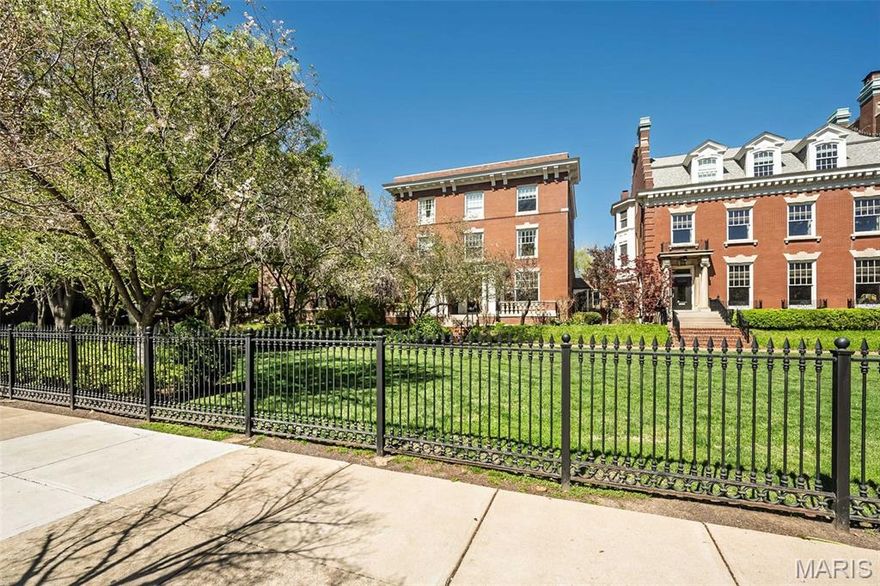 Beautifully reimagined townhome in the coveted Maryland Place enclave, overlooking enchanting European inspired gardens and central fountain.  This distinguished Federal style residence is on the second floor and offers approximately 1,687 square feet of refined, two story living, defined by soaring ceilings and an abundance of natural light.  The main level unfolds with effortless elegance, featuring gracious flowing spaces ideal for both everyday living and sophisticated entertaining. A welcoming dining room leads to a beautifully appointed, designer kitchen complete with quartz countertops, bespoke cabinetry, a central island and premium Viking appliances.  The living room is both warm and inviting centered around a fireplace and opening seamlessly to a private deck and stairs to the secure two car garage access.  Upstairs, two generously proportioned en-suite bedrooms provide serene retreats, each enhanced by its own gas fireplace and luxurious bath.  A conveniently located hall laundry and charming garden views complete the upper level.
Additional amenities include a spacious basement ideal for storage, a private and secure two-car garage with opener and gated guest parking area.  Perfectly positioned near fine shopping, dining and the cultural allure of Forest Park.  This exceptional residence is truly move-in ready and showcases impeccable updates and timeless European sophistication throughout.