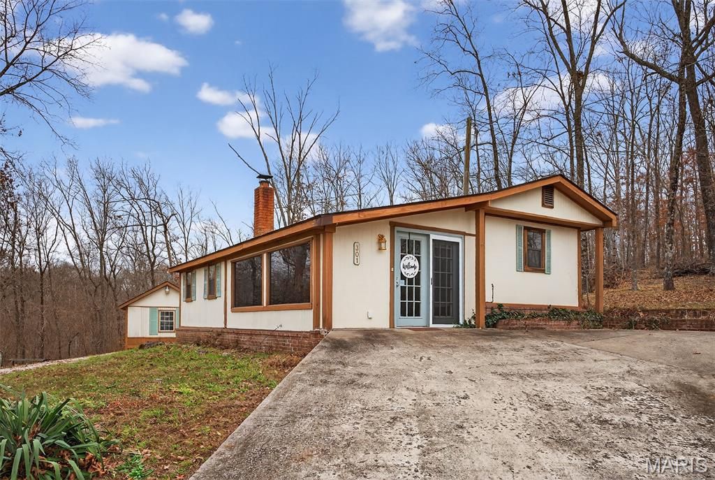 Photo of 301 Little Dogwood Lake Road, Burfordville, MO 63739 (MLS # 26003416)