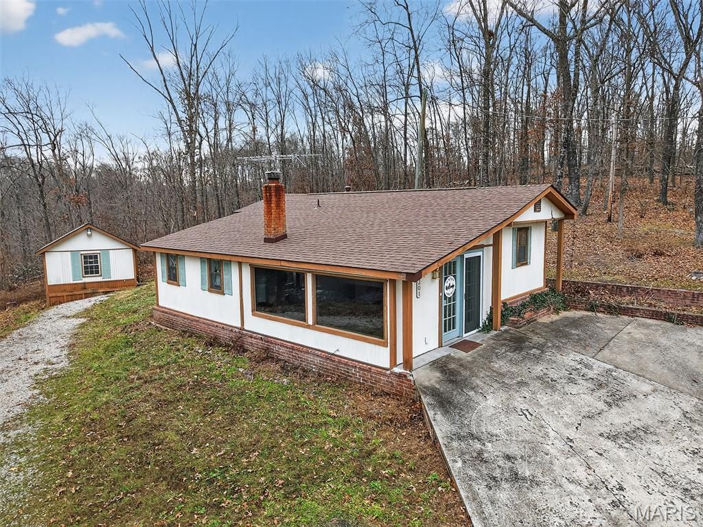 Photo of 301 Little Dogwood Lake Road, Burfordville, MO 63739 (MLS # 26003416)