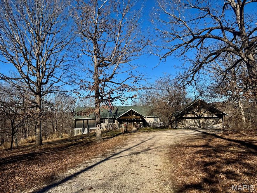 Beautiful Raised Ranch Country home in a secluded location on 15 surveyed acres. The views from the walkout basement to the lovely patio are incredible. There is a detached garage and a 30x50 Garage/shop w/deer camp living area.