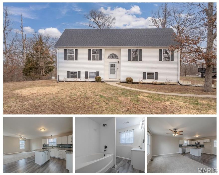 Price Improvement! BEAUTIFUL split level home on almost 1/2 acre with a tuck under oversize 2 car garage!  The main level has a dining area that is open to the kitchen and living area. Kitchen has stainless appliances, glass backsplash and quartz countertops. Large deck off the back with access from the dining area. The 3 bedrooms on the main level are good sized with neutral colors. Primary bedroom has an ensuite with shower. The lower level is mostly finished with a 4th bedroom or could be used as flex space, it has an attached ensuite. Laundry room is here along with access to the oversized garage. On a large lot with some low matainance landscaping. Fantastic location, Wright City school district and public utilities. 15 minutes from Wentzville, Warrenton and Troy. Even closer to Indian camp creek and park. Be sure to set an appointment to see this in person - you will probably love it!