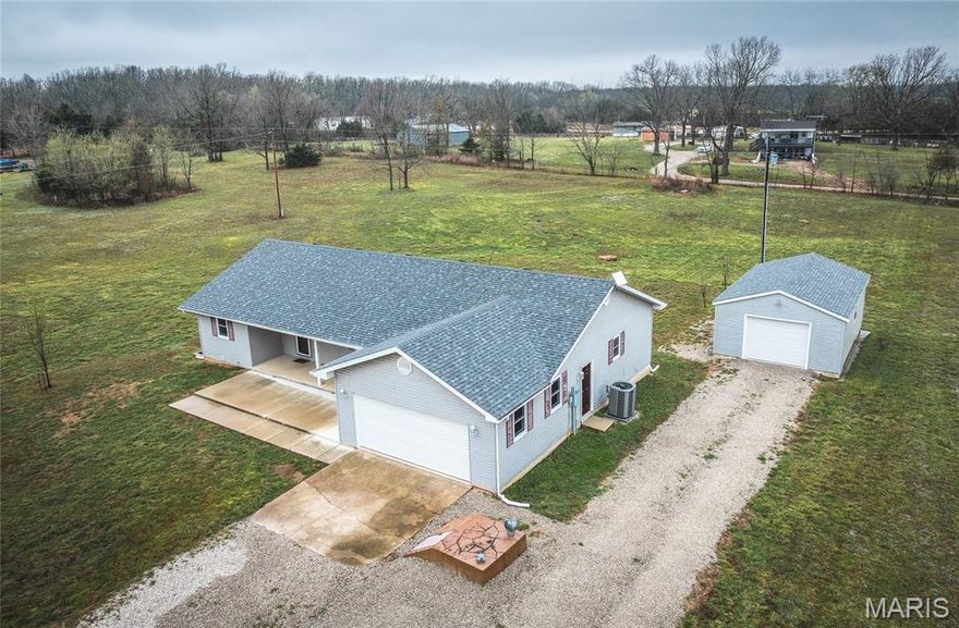 Move-in ready and beautifully updated, this 3-bedroom, 2-bath home sits on 1.25 acres and offers the perfect blend of comfort, space, and functionality. From the moment you step inside, you’ll notice the fresh, modern feel with all new flooring and paint throughout the interior, along with updated trim, fixtures, knobs, hinges, and outlet covers that give the home a cohesive, updated look. The layout provides a great flow for both everyday living and entertaining, with comfortable living spaces and well-sized bedrooms. A storm shelter adds an extra layer of safety and peace of mind. Step outside and enjoy the space and versatility this property has to offer. The 2-car attached garage provides convenience, while the 1-car detached shop with electric and heat is perfect for hobbies, a workshop, or additional storage. The backyard has been thoughtfully regraded to direct water away from the home, and a newly added driveway makes access to the shop easy and practical. Additional upgrades include a newer AC unit installed last year, as well as smart home features like an ECO B smart thermostat and doorbell. The transferable Starlink service offers reliable high-speed internet, making this property ideal for remote work or streaming without interruption. With over an acre of land, there’s plenty of room to enjoy outdoor living, gardening, pets, or simply the privacy and space that comes with a larger lot. This home combines modern updates, functional improvements, and room to grow—making it a must-see for buyers looking for a turnkey property with extra amenities.