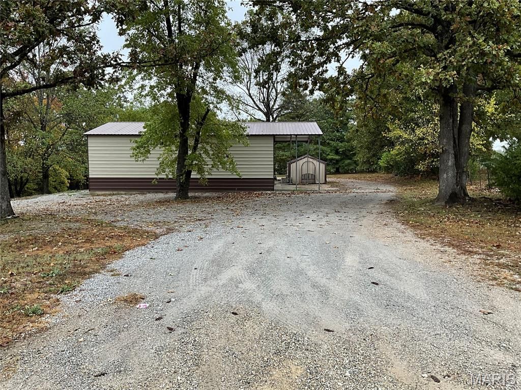 Photo of 4007 State Route 14, West Plains, MO 65775 (MLS # 25072655)