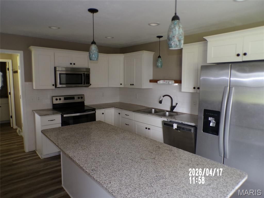 Photo of 318 Farmers Lane, Lebanon, MO 65536 (MLS # 26025973)