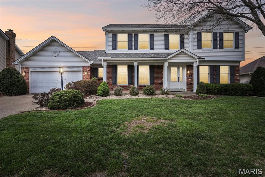 Stunning two-story home with finished basement located on a cul-de-sac in St. Charles. Kitchen remodeled in 2023 with updated white cabinetry with crown moldings and blue island with room for 6 to sit at, quartz countertops and backsplash, stainless steel appliances, and expansive gas range with 6 burners, griddle complete with a pot filler and double ovens. The beautiful living room with bay window has a feature fire place flanked by built in bookshelves is connected to the kitchen with a wet bar area. Separate dining room, main-floor office, laundry room, and half bath provide complete the main level.  LVP flooring installed on the main level in 2023. Upper level features four bedrooms, including a primary suite with ensuite bath (separate tub and shower) and walk-in closet. Additional full bath upstairs. Carpeted bedrooms with ceramic tile in bathrooms.
Finished basement includes multiple living areas, full bathroom, and storage space, plus unfinished utility room. Basement layout allows for separate living, recreation, and bonus sleeping area for guests. 
Exterior includes a level backyard with patio and landscaped surroundings. Covered front porch spans the front entry.
Updates include roof (2020), A/C pump (2021), and HVAC (approx. 5 years). Two-car attached garage. 
Located 0.6 miles to McNair Park, 3.6 miles to Historic Main Street St. Charles and Frontier Park, 5.7 miles to New Town St. Charles, and 9.3 miles to Katy Trail access, with Hwy 370 access approximately 3 miles away. Includes 3D walkthrough and video tour.