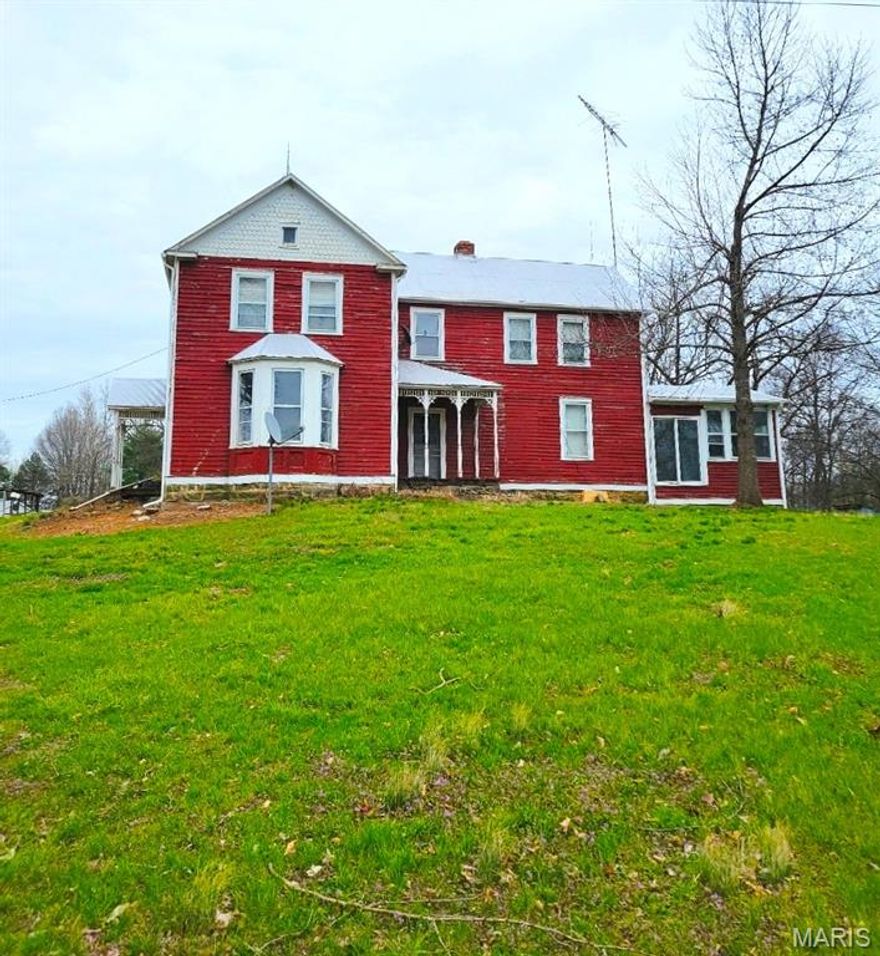 If you've always dreamed of living on 2.5 acres with a glorious view of the river, and have the means to restore this farm house to it's former glory, this is the property for you!  Nestled on the edges of Hermann in wine country, this is a large home, has 3 big bedrooms upstairs, and either 2 living rooms, or one living room and a huge bedroom on the first floor.  The living room has a bay window with glorious views of the Gasconade River.  There aren't many views like this left.  The house needs a lot of work, so it is priced accordingly.  The home will need a new roof, windows, paint, flooring, etc.  The yard here is amazing, tons of grass, no immediate neighbors and backs to woods.  There are some outbuildings that could be restored as well.  This home in near Gascony Village so if you join the community as an amenity user (currently $495/year) you would have access to their boat launch, beach, pool, playground, etc.  This property is being sold as is.