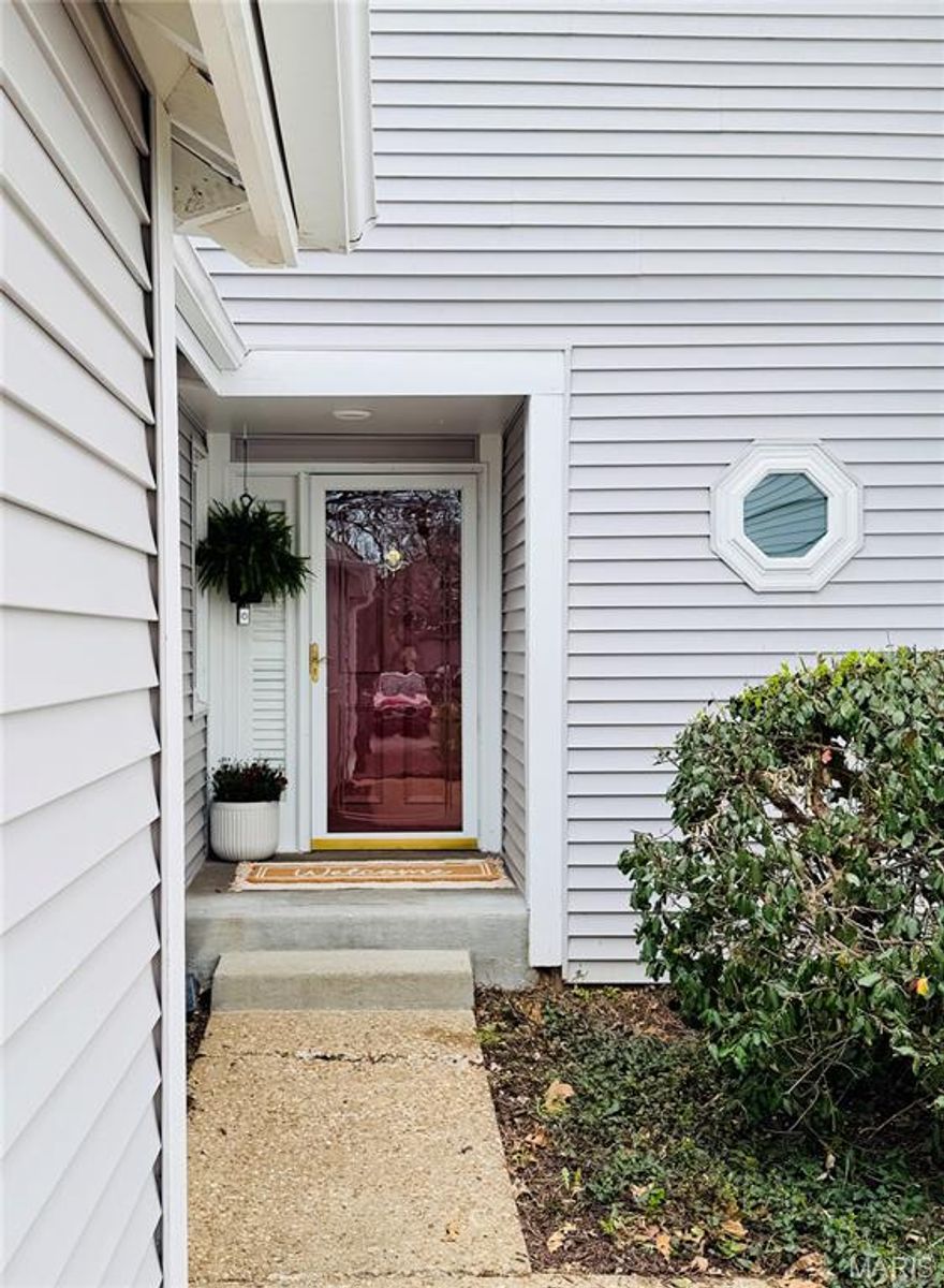 LOCATION! LOCATION! LOCATION!  If you're looking for a low maintenance town home in a sought after area, close to every amenity you can imagine, look not further.   This charming two bed, four bath town home is awaiting its new owner.  The main level features hardwood flooring throughout, offering a seamless transition from the bright custom kitchen, to the stately adorned living area with rustic stone fireplace.  The living area transitions to a maintenance free deck, perfect for enjoying that morning coffee or evening cocktail.   The kitchen features brand new appliances and stunning quartz countertops. Step upstairs, to a spacious primary suite offering a HUGE updated private bath with dual sinks and walk in closet, complete with custom organizers.  A second bedroom and full bath complete the upstairs.  The lower level is partially finished and a perfect space for a secondary family room, game/rec room, or giving guests their own private retreat.  A half bath, laundry room and added storage, complete the lower level which walks out to its own private patio and fenced yard.   Additional features, include an attached two-car garage, new roof and newer furnace  Just minutes from the CHESTERFIELD AMPHITHEATER , located in a fabulous community that includes a pool, common area, fishing lake, walking trails, clubhouse, and fitness center.  This one is a must see!!