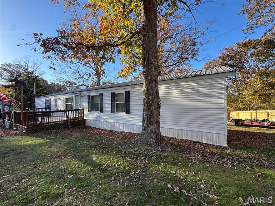 Beautiful property with 9 +/- acres at Lake Wappapello! Includes detached 22x33 shop with concrete floors and electric, plus a storage shed. The 1998 modular home features 6-inch walls, walk-in closets, and a new septic tank installed in 2022. The roof is less than six years old, and a heat pump was installed in 2021. Brand new 750 feet of wooden privacy fence, perfect for pets, and within minutes of Lake Wappapello!!

PLEASE DO NOT DISTURB OCCUPANTS. ALL SHOWINGS MUST BE SCHEDULED THROUGH A LICENSED REAL ESTATE AGENT. PROPERTY IS UNDER 24-HOUR VIDEO SURVEILLANCE AND RECORDING AT ALL TIMES. DO NOT STOP, APPROACH, OR SLOW DOWN AT THE PROPERTY WITHOUT A CONFIRMED APPOINTMENT. PRE-QUALIFIED BUYERS ONLY.