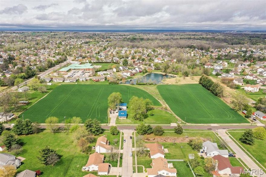 Endless potential awaits with this exceptional development opportunity! Just over 11 acres of beautifully level ground already platted for 19 lots, surrounded by established neighborhoods, nearby utilities, and peaceful pond views. Whether you envision a new residential community, mixed-use concept, or neighborhood retail destination, this property offers the rare combination of location, layout, and flexibility. The groundwork is in place — now it’s your turn to bring the vision to life and create something truly special!