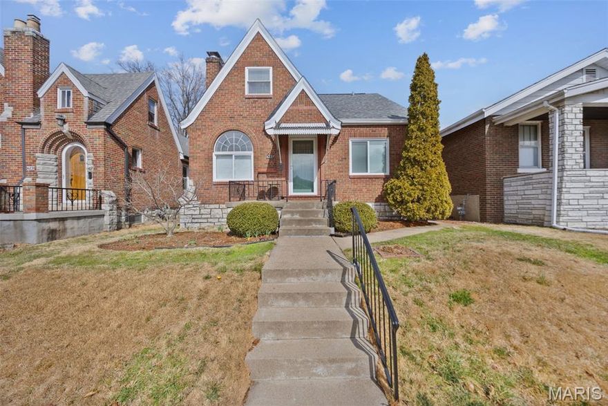 Nestled near Lindenwood Park, this classic brick beauty welcomes you with gleaming hardwood floors, a statement gas fireplace, and stunning stained glass windows that give the living room instant character. The updated kitchen features stainless steel appliances, updated countertops, and plenty of cabinet space. It flows seamlessly into a separate dining room that’s perfect for hosting. Two main-floor bedrooms and a full bath offer convenience and flexibility. Upstairs, you’ll find three additional bedrooms and a second fully renovated full bath, giving you space to grow.  Zoned heating and cooling adds year-round comfort. The finished basement expands your living space. Outside, you’ll love having a detached 1-car garage plus a parking pad and a generous fenced-in backyard. All of this in a prime South City location close to parks, shopping, and some of your future favorite neighborhood restaurants.