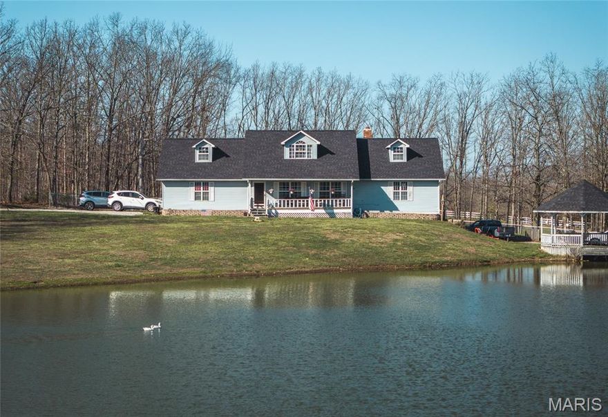 This one-of-a-kind property truly has it all! Nestled on nearly 3 acres, this stunning home offers the perfect blend of comfort, space, and outdoor living. With 5 bedrooms and 3 full bathrooms, there’s room for everyone to spread out and enjoy. A welcoming covered front porch invites you in, setting the tone for the warmth and charm you’ll find throughout the home. Inside, you’ll love the spacious layout featuring a large country kitchen equipped with stainless steel appliances, a center island, and an abundance of cabinet and counter space—perfect for cooking, entertaining, or gathering with family and friends. The main level offers two bedrooms for convenience and flexibility, while the upper level features a massive primary suite that feels like a private retreat, along with an additional bedroom. The fully finished basement adds even more living space, ideal for a second family room, game room, home gym, or guest quarters—endless possibilities to fit your needs. Step outside and enjoy your own private oasis. The backyard is designed for both relaxation and entertaining, featuring a beautiful inground pool with a covered deck area—perfect for summer days and evening get-togethers. The fenced-in yard provides peace of mind, while the impressive 1-acre pond with its own gazebo creates a serene setting for fishing, relaxing, or simply taking in the view. Multiple equipment sheds offer plenty of storage for tools, toys, or hobbies. Located in Salem, this property is surrounded by natural beauty and is just minutes from state parks, rivers, and endless outdoor recreation opportunities including hiking, floating, and hunting. Whether you're looking for a peaceful retreat, a place to entertain, or a property with room to grow, this one truly checks all the boxes!