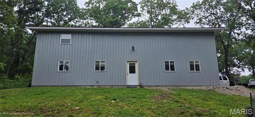 This 36x50 barndominium with 16-ft walls sits on 8 private acres and is ready for your finishing touches. Featuring one framed bedroom, spray in insulation, and a newer septic and well, much of the hard work is done.

All-electric with a pellet stove for supplemental heat, this structure offers great potential for a custom home, shop-house, or weekend retreat. Plenty of space, privacy, and flexibility to make it your own.