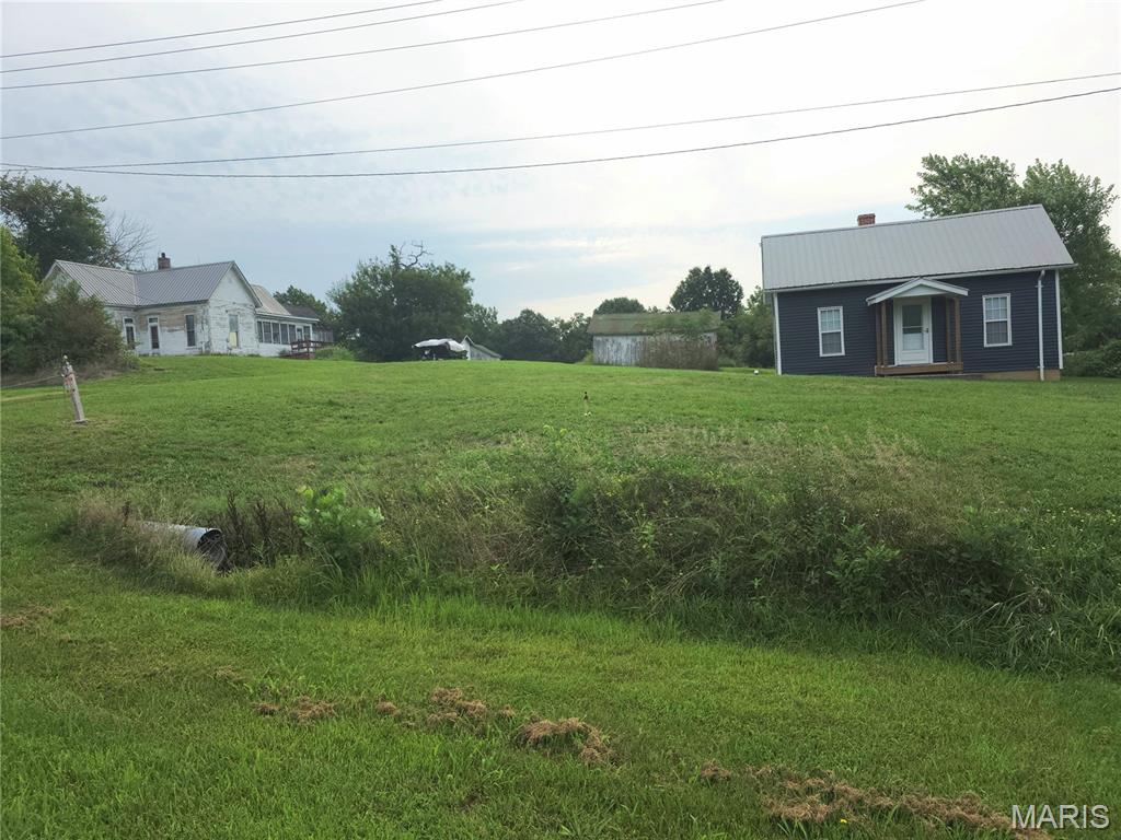 Photo of 322 Palmyra Street, Perry, MO 63462 (MLS # 26051302)