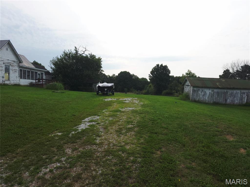 Photo of 322 Palmyra Street, Perry, MO 63462 (MLS # 26051302)
