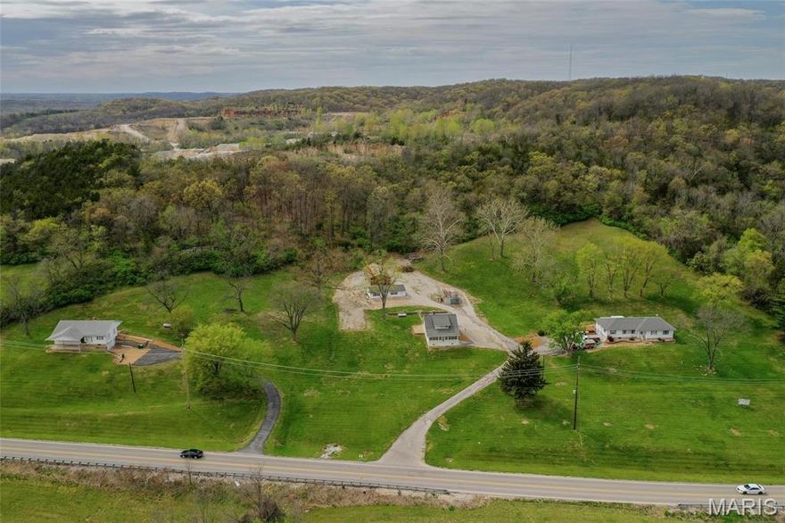 Prime land development opportunity nestled in the heart of Jefferson County. Spanning over 10 acres and comprising five distinct parcels, this expansive site presents a canvas primed for your visionary project. With its strategic location boasting visibility from the bustling I-55, attracting over 40,000 vehicles per day, your development will enjoy unparalleled exposure and accessibility, setting the stage for unprecedented success.

Zoned R-40 Residential, this property offers a versatile framework for a myriad of development possibilities, whether it be a vibrant residential community, a commercial endeavor, or a mixed-use masterpiece. Situated in unincorporated Jefferson County, you'll benefit from the flexibility of regulations while capitalizing on the area's burgeoning growth and promising future. As an added bonus, the presence of three renovated homes on the site provides immediate potential for rental income.