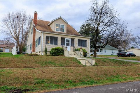 Photo of 822 E Olive Street, Scott City, MO 63780 (MLS # 25078356)