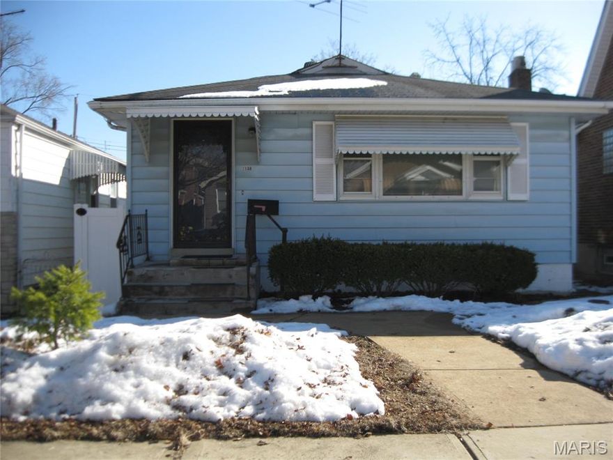 Well cared for! CLEAN! Everything functioning! Very Recent WHITE kitchen with Solid Surface counters and under counter double sinks! Plenty of can lights. All stainless GE appliances: Gas stove, Microwave, Dishwasher, French Door Refrigerator with Icemaker! Plus disposal. 
Lower level was a separate living quarters with a laundry room large enough that it functioned as a 2nd kitchen also. Full 2nd bath in LL. Finished and paneled with a central living area and 2 sleeping areas. including additional electric baseboard heater.
Yard is fully fenced with a patio area and covered porch. 
OVERSIZED 2 car garage with garage door opener & 2 remotes; alley access.