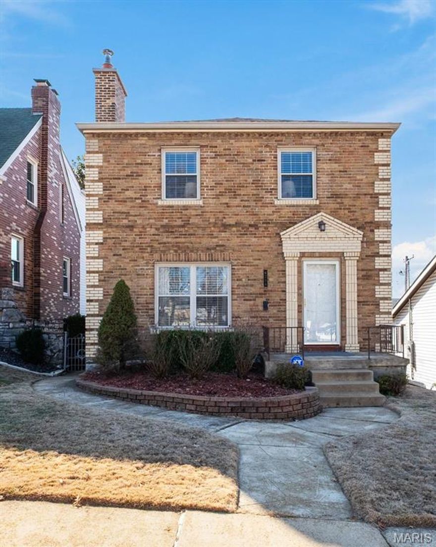 Welcome home to this beautifully maintained two-story brick home offering timeless charm located between Lindenwood Park and Francis Park in the desirable area of South City. Great curb appeal with well manicured landscaping and a classic brick exterior.
Step inside to discover stunning wood floors that flow seamlessly throughout. The inviting living room with built in display shelves features a cozy wood-burning fireplace — perfect for relaxing evenings or gathering with friends and family. Large dining room separates the living area from the bright kitchen equipped with stainless steel appliances. Upstairs you will find a very spacious primary bedroom, a second bedroom both with ample closet space and an updated full bathroom.
Enjoy your morning coffee or evening breeze from the bright sunporch overlooking the level, fenced backyard — ideal for pets, play, or entertaining.
Additional highlights include a detached garage and a clean, dry, partially finished basement complete with a bonus recreation room that could easily be converted into an additional bedroom or home office.  Also walk-up access to backyard, generous storage and sump pump.
Located in a charming neighborhood close to parks, local entertainment, shops and restaurants this home offers both tranquility and convenience to access everything you need.
Don’t miss the opportunity to own this move-in-ready gem that perfectly blends character, comfort, and location.