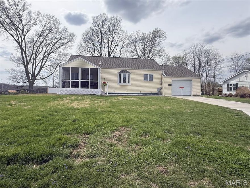 Updated, move-in ready home! You are welcomed to this charming home by the screened in front porch. Main level has living room, kitchen/dining room combination, two bedrooms, and one bathroom. The laundry connections are in a closet off the kitchen. There is a one car attached garage with exterior door to back yard. Unfinished basement with walk up door to back yard. The home has a white, privacy fence in the back yard and a flat back yard. Updated features are siding, roof, windows, bathroom, driveway, furnace, and air conditioner.