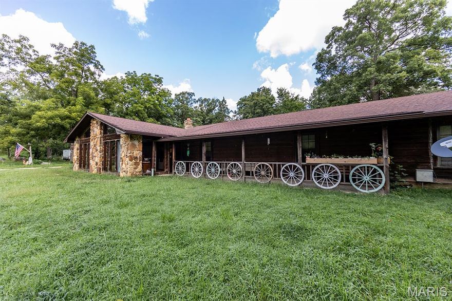 Discover the ultimate tranquility with this remarkable ranch set on 5.7+/- acres! This property offers limitless potential, whether you envision it as a private homestead or a unique retreat.
As you approach the long & winding driveway, you'll be greeted by a charming covered bridge, over a picturesque creek, setting the stage for this property! Step inside the expansive home & be captivated by the vaulted living room, filled with natural light & boasting a rock fireplace. The roomy kitchen is a culinary haven, equipped with commercial appliances, & plentiful cabinetry, while the dining room boasts ample space for large gatherings, all framed by views of the breathtaking landscape!
With 11 bedrooms, 8 half baths, & 2 full baths, this property offers spacious accommodations, ideal for a variety of uses. Nestled near national forests, state parks, rivers, & more, providing endless opportunities for outdoor exploration.
Don't miss the chance to experience this one-of-a-kind property!