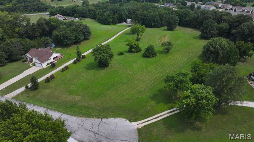 Experience the best of both worlds with this 4.12-acre property offering the space of country living just minutes from Wentzville and Lake St. Louis. The flat, open land is ready for your vision—whether you’re building your dream home or creating a private retreat.

Enjoy a quiet setting without sacrificing convenience, with easy access to top-rated schools, shopping, dining, and major highways including 70 and 40/61 for a smooth commute.

With utilities nearby and minimal restrictions, this property offers incredible flexibility and potential in one of Missouri’s fastest-growing areas. Bring your builder and make it your own!