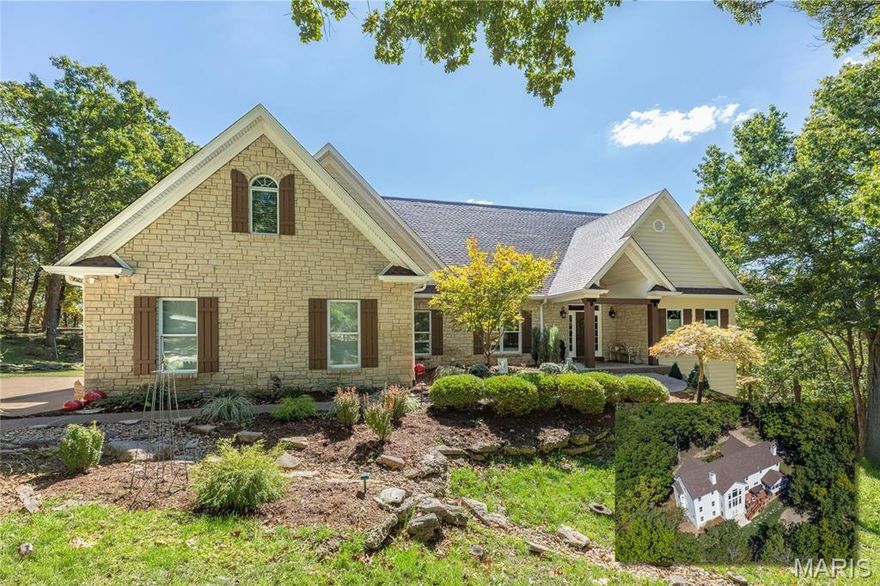 Back on Market - No Fault of Seller - Buyer Couldn't Perform on Home Sale Contingency. Exceptional 1.5-Story Estate on 5.27 Wooded Acres in Wildwood, set on a private, dead-end street and surrounded by serene wooded beauty. This extraordinary 5-bedroom, 5-bath residence offers over 5,400 square feet of refined living space, including a professionally finished walk-out lower level. Completely updated inside and out in 2024, this home blends timeless elegance with modern luxury and is truly move-in ready. From the moment you enter, soaring ceilings and a dramatic two-story wall of windows fill the great room with natural light and frame the peaceful outdoor setting. A beautiful stone fireplace, rich hardwood floors, and custom wood beams create a warm yet sophisticated atmosphere. The open main level is designed for both everyday living and elevated entertainment, featuring a private den or office and seamless flow throughout. At the heart of the home is a gourmet kitchen with custom cabinetry, quartz countertops, 10-foot center island, coffee bar, and a custom walk-in pantry with cabinetry and workspace. Top-of-the-line Bosch stainless appliances include a 6-burner gas cooktop with handcrafted wood hood. The kitchen opens to a breakfast room with Butler’s pantry and wine fridge and continues into the hearth room with a second stone fireplace and access to the screened-in porch, creating an ideal space for year-round gatherings. The main-floor primary suite, completed in 2024, is a true retreat with a large custom walk-in closet by St. Louis Closet Company and a spa-like bath featuring a soaking tub, multi-head walk-in shower with bench, custom double vanity, built-in makeup area, and heated floors. A beautifully designed laundry room with custom cabinetry, quartz counters, and deep stainless sink, along with a stylish powder room, complete the main level. Upstairs, you’ll find three spacious bedrooms, including one ensuite, a Jack-and-Jill bath, and an impressive bonus room that serves as a fifth legal bedroom or flexible living space. Dual staircases and a Juliet balcony add architectural interest and flow. The professionally finished walk-out lower level offers 9-foot ceilings, a large recreation area with multiple seating zones, a custom wet bar, fitness space, an updated half bath, and multiple generous unfinished storage areas. Additional highlights include a new roof in 2024, Newer Hardie cement board siding, dual-zoned high-efficiency HVAC with Wi-Fi thermostats, a 20kW whole-house gas generator, outdoor lighting, security system with camera surveillance, aggregate front porch and walkway, professional landscaping, fenced backyard, and an oversized 3-car side-entry garage with epoxy floors. A new 14’ x 15’ custom shed garage (2025) with electric provides ideal storage for ATVs, tools, or hobbies. Relax on the screened-in porch, expansive upper deck or lower patio and enjoy the peaceful, private setting. This remarkable property is perfect for family gatherings, entertaining friends, and everyday living surrounded by nature. Ideally located near shopping, dining, county parks, and major highways, this home offers the rare combination of privacy, luxury, and convenience.