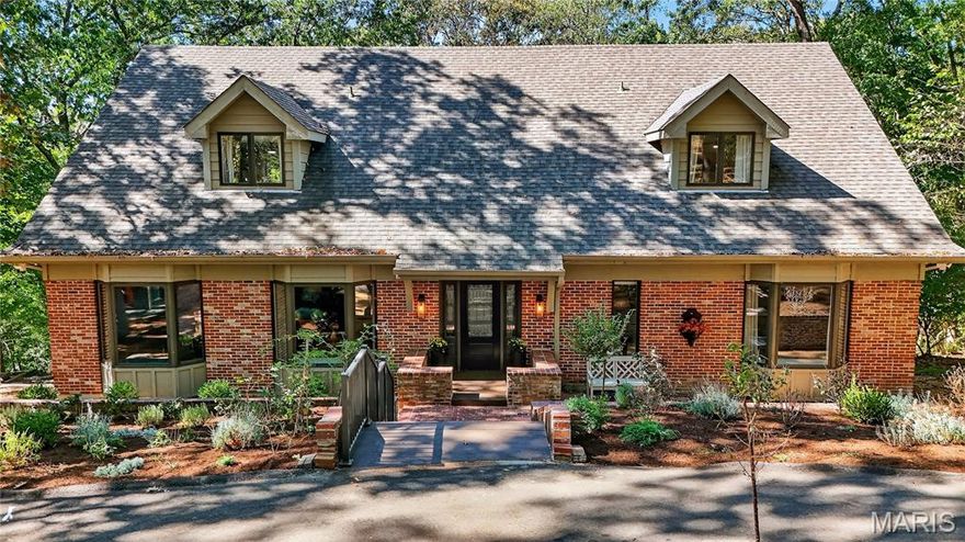 Completely remodeled from top to bottom, this modern retreat offers the perfect blend of privacy, community, and convenience. Set at the end of a quiet cul-de-sac on just over an acre surrounded by woods, the home provides a peaceful, tree-filled escape in a gem of a neighborhood known for its friendly neighbors, yet private settings. Natural light fills the open floor plan with wide plank wood flooring and nature views from every window. The kitchen feels like a treehouse, and the soaring two-story great room opens through three new sliding doors to a brand-new composite deck—ideal for entertaining or quiet evenings outdoors. The main-floor primary suite offers three closets, a luxurious walk-in shower, and direct deck access. A second large main-floor bedroom with an updated en suite is perfect for guests or multigenerational living. Upstairs, two oversized bedrooms each feature updated en suite baths, providing comfort and privacy for family members of all ages. The walkout lower level includes a spacious recreation area, full bath, and a stylish bar, plus two sliders leading to a patio and level, fenced turf yard—perfect for kids and pets. A newly finished 400 sq. ft. room with its own entrance provides flexible space for a home office, gym, craft room, or studio. Enjoy the serenity of nature, the warmth of community, and the convenience of being minutes from shopping, parks, and top-rated Rockwood schools. Kitchen refrigerator, washer, dryer, lower level bar (all less than one-year-old) are included!