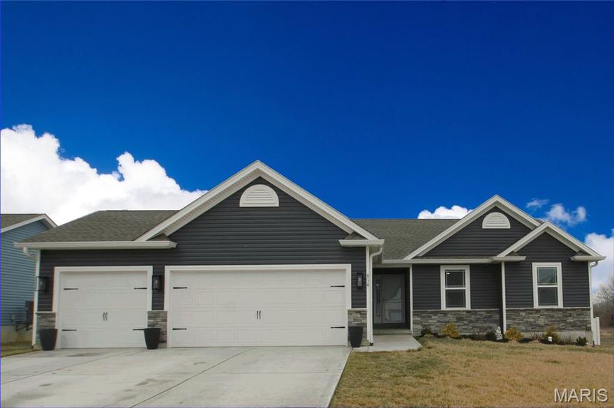 YOU WON'T WANT TO MISS THIS Moscow Mills RANCH offering 3 Bedrooms, 2 Full Baths & OVERSIZED 3-Car Garage! Upon entering, you're eyes will be drawn to the OPEN FLOOR PLAN & VAULTED CEILINGS spanning the Great Room into the Kitchen & Breakfast Room * Mohawk RevWood Plus Laminate floors * Optional Kitchen Layout features White Soft-Close Cabinets with Base Cabinet Pull-Outs: Shelves, Spice & Large Utensil and Trash/Recycle, Cambria QUARTZ Counters with Counter Height Overhang for Counter Stools, Black Glass Tile Backsplash, Black-On-Black Appliances: Smooth-Top Range, Microwave, Dishwasher & Refrigerator * Slider in Breakfast Room opens to 12x16 COVERED Patio and Spacious Fenced Backyard...5FT VINYL Semi-Privacy * Walk-In Closet in Primary Bedroom & Luxury Ensuite Bath boasts Dual Split Vanities, Corner Soaking Tub & Separate Shower * 2 Add'l Bedrooms & Hall Bath * Main Floor Laundry with Built-In Cabinet/Cubbies/Folding Station * OVERSIZED & INSULATED (Walls & Doors) 3-Car Garage features a 26' DEEP Bay...Perfect for an Extended Cab Truck or Workshop, plus Service Door to Backyard * Full UNFINISHED Basement is ready for FUTURE FINISH with Rough-In Plumbing & Egress Window * Upgraded Lighting & Fans Throughout * SCHEDULE YOUR APPOINTMENT TODAY!