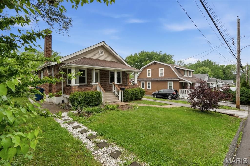 Photo of 2413 Leslie Avenue, Overland, MO 63114 (MLS # 26026741)
