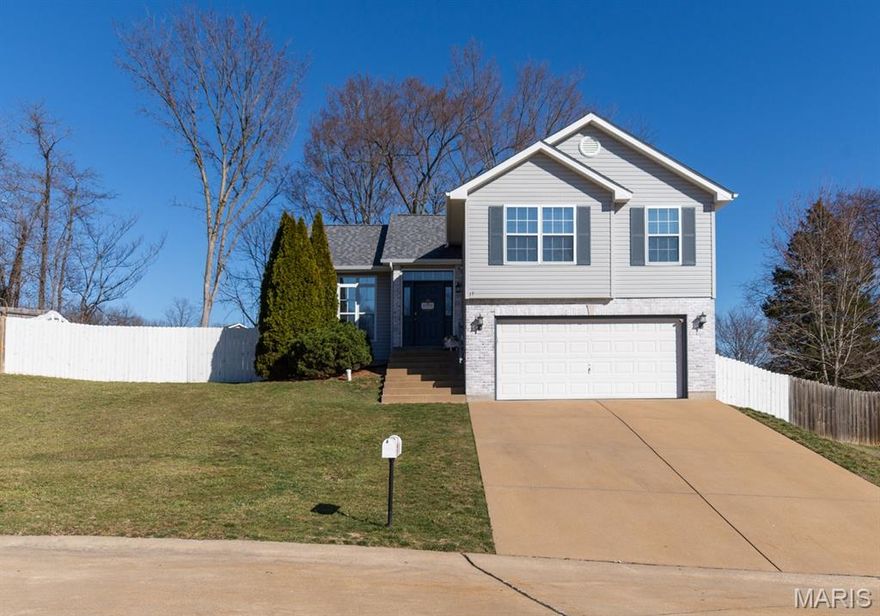 OPEN HOUSE Sunday 3/29 1:00 to 3:00.  Showings Begin 11:00am Saturday 3/28.  Welcome to this beautifully updated tri-level home in the highly sought-after Williamsburg Subdivision in the heart of Crystal City! Offering over 1,600 sq ft of inviting living space, this home perfectly blends modern updates with warm, comfortable living. From the moment you walk in, you’ll appreciate the open floor plan and soaring vaulted ceilings that create an airy, light-filled atmosphere ideal for both everyday living and entertaining. The stunning, fully updated kitchen is truly the centerpiece of the home, featuring custom cabinetry, abundant cabinet and counter space, stylish countertops, newer appliances, and a huge stainless steel sink with a pull-down faucet—perfect for both cooking and gathering. Whether you're hosting guests or enjoying a quiet night in, this space is designed to impress.  Just a few steps up and you'll find the massive primary suite with a walk in closet and en suite featuring a soaking tub, shower stall, and double vanity.  Two generous sized bedrooms and full bath round out the upstairs. The lower level features an expansive family room with recessed lighting with an abundance of natural light and half bath—an ideal space for movie nights, game days, or simply unwinding after a long day. In addition, there is an unfinished basement providing more space and plenty of storage.  Step outside and fall in love with the private backyard, complete with a privacy fence and large storage shed. Imagine enjoying your favorite beverage on those cool summer evenings, relaxing in the comfort of the screened porch while taking in the peaceful surroundings. Recent updates include panel doors, fresh paint, luxury vinyl flooring, new lighting, ceiling fans, bath room fixtures and vanities, all giving the home a fresh, modern, move-in ready feel. Major exterior updates provide added peace of mind, with the roof, siding, gutters, and downspouts all just 1.5 years old. Homes like this—updated, well-maintained, and located in a desirable neighborhood—don’t come along often. Schedule your showing today before this one is gone!