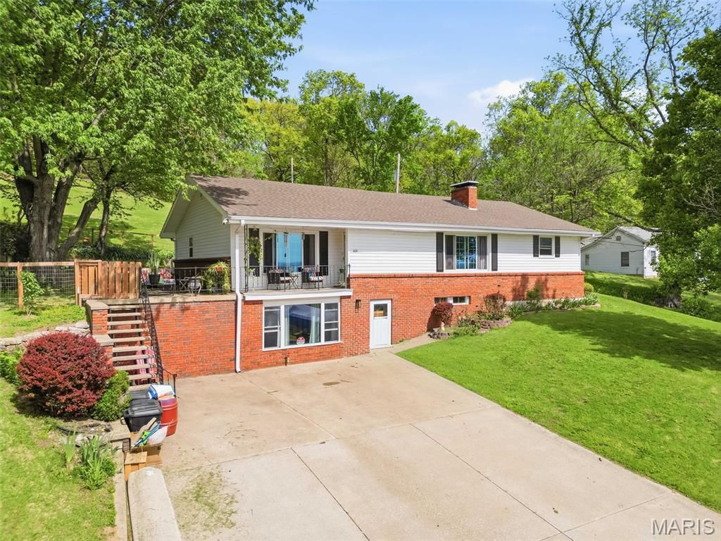 Photo of 409 Luke Street, Clarksville, MO 63336 (MLS # 26024445)