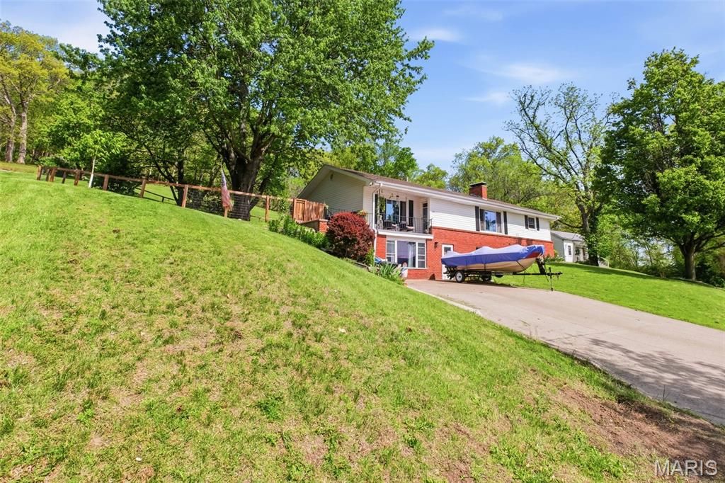 Photo of 409 Luke Street, Clarksville, MO 63336 (MLS # 26024445)