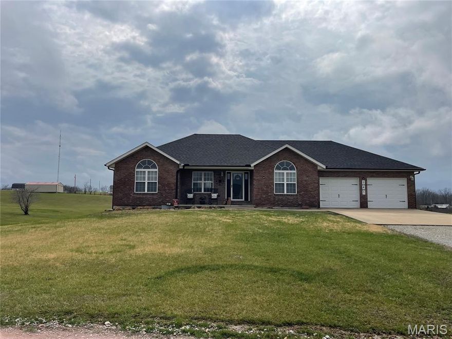 Wow - This property has been transformed to a showstopper!  Approximately 10 minutes to I-55.  Beautiful home sitting on 6.6 acres that includes a detached garage and an additional barn.  Home & shed includes new siding/soffit/gutters, HVAC 2023, water heater 2025, new front, patio & basement doors & water softener 2026.  2023 new roof on house and shop.  2023 new garage doors and openers.   You will not believe the relaxing view from the covered patio.  All of this in Jackson School District. This is the one you have been looking for.