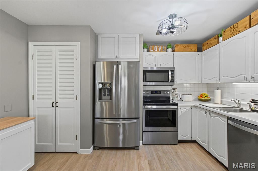 Photo of 13453 Coliseum Drive #F, Chesterfield, MO 63017 (MLS # 26019606)