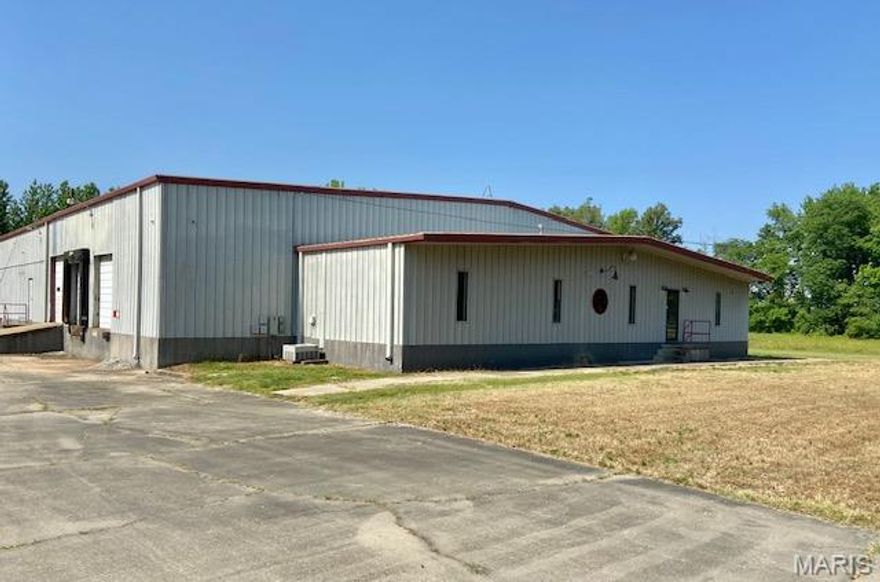 Great Business opportunity, this steel building has 15,000 square feet of warehouse with 3 - 9ft. overhead doors and a recently added 14 ft. overhead door. Phase 3 Electric . Perfect loading Dock with concrete driveway. Located in Dexter's Industrial Park. This spacious building has 3 offices , a conference room, recently added new lighting and a Security system. This building comes with 38.8 Acres of farmland which is being rented for an extra income.