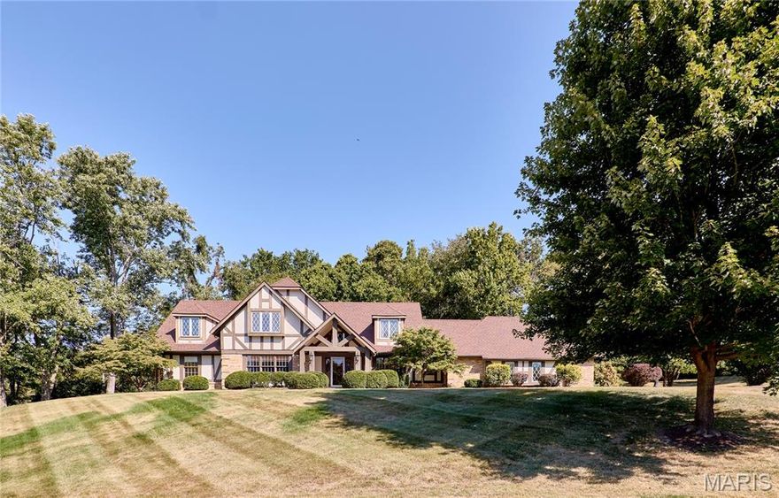 WELCOME TO 10 FOREST CLUB DR..ONE OF A KIND PROPERTY PERCHED ON A 1.2 ACRE, ELEVATED LOT OVERLOOKING THE 6TH HOLE IN THE BEAUTIFUL FOREST HILLS COUNTRY CLUB COMMUNITY! A TRUE FIVE-BEDROOM 1.5 STY WITH THREE FULL BATHS AND THREE HALF BATHS. This home is just waiting for the next owner to enhance finishes. Solid brick and cedar exterior, 3-car rear entry garage, sprinkler system, aggregate walkways and patio and a screened porch above walk-out basement with wooded view. Gorgeous hand-carved wood staircase, antique wood wet-bar in great room, beamed/vaulted ceilings, floor-to-ceiling see-thru fireplace set the tone for a designer's dream. Light and airy kitchen, main floor laundry & mudroom. Four spacious bedrooms upstairs with ample closet space, architecturally friendly alcoves & two full bathrooms. Lower level has family room with wet-bar & half bath, a sitting room, a rec room with walkout, a large storage/workshop room, separate storage with built-in shelving, and another prep/storage room. Bring your contractors, designers or just your own updating visions to make this amazing property your own!