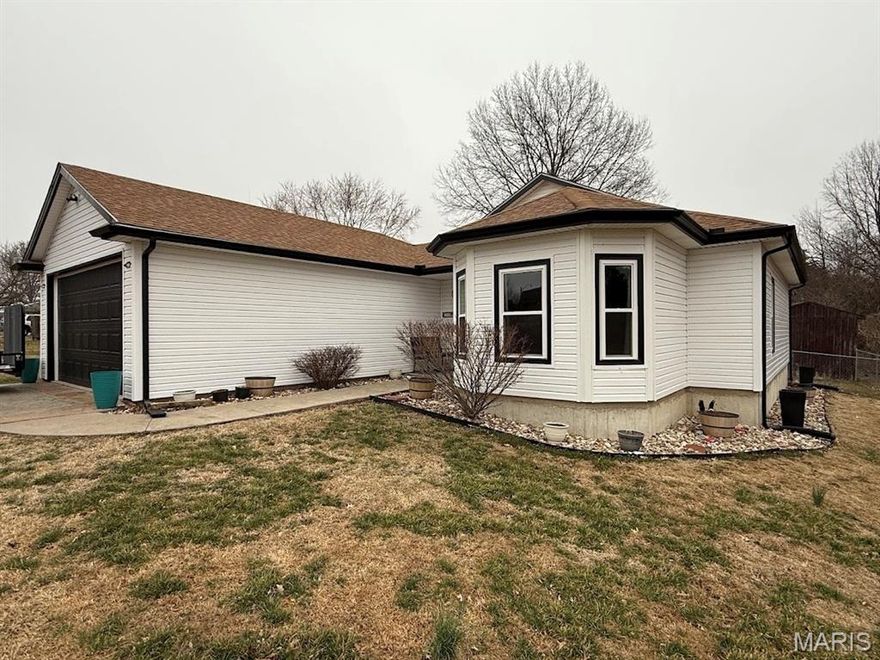 This well-maintained three-bedroom, two-bathroom home offers 1,180 square feet of comfortable living space and was constructed in 2009. The interior features attractive finishes throughout, updated appliances, and ceiling fans that enhance both style and comfort. The functional floor plan provides an efficient use of space, making it ideal for families, first-time buyers, or those looking to downsize. Situated on a generous quarter-acre lot in Fulton, the property boasts a nicely fenced backyard--perfect for pets, children, or entertaining. A back patio offers a great space for outdoor gatherings or relaxing evenings at home. Additional amenities include a two-car attached garage for convenient parking and storage, as well as a storage shed in the backyard .