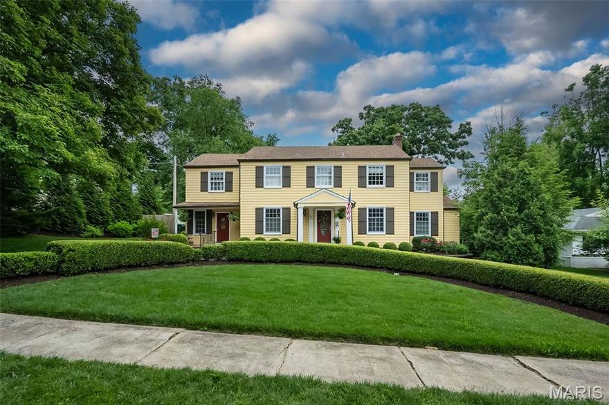 A gracious 2-story 5-bedroom, 3.5-bath colonial home offering 3400 square feet of beautifully maintained living space, classic architectural details, and a backyard retreat designed for entertaining. This home features a formal dining room and spacious living room with a brick fireplace which opens into a vaulted ceiling great room. The great room allows in beautiful natural light, with French doors opening onto the resort-like deck, patio, pool and gardens. The main level has hardwood floors throughout with an easy flow pattern and circular routes. A large, bright family-centric kitchen features granite counters, a butcher block island, stainless steel appliances, a wet bar, under-cabinet lighting, and a delightful greenhouse window. There is a powder room conveniently located adjacent to the kitchen. A smaller family room/den/office or potential garage is located on the opposite side of the kitchen. A main floor bedroom with an ensuite bath offers 100% accessibility: ideal for guests or multi-generational living. On the upper level there is a large primary bedroom suite with 2 closets & a sitting room; 3 additional spacious bedrooms – with plantation shutters and ceiling fans; and 2 full baths. The lower level has two staircases leading to a children’s play area with epoxy flooring on one side and a work/storage space on the other side with access to the backyard. The home is located just minutes from Old Webster’s vibrant shops, business district, and variety of dining.