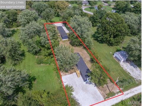 Photo of 115 High Street, Truxton, MO 63381 (MLS # 26059357)