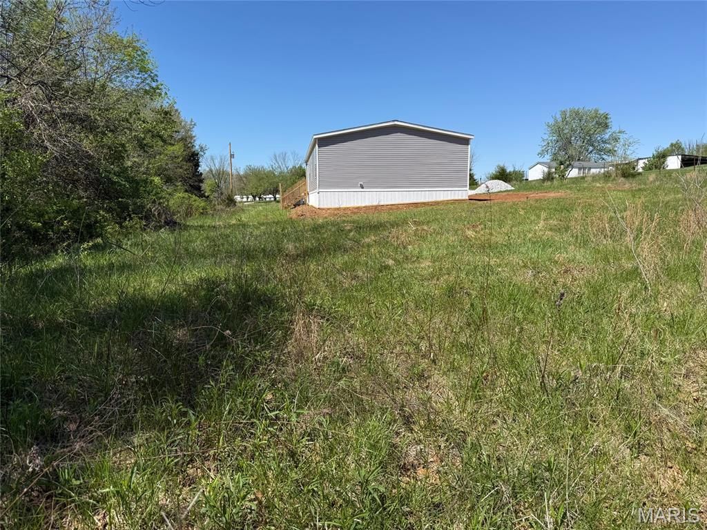 Photo of 3134 Creek Road, Moscow Mills, MO 63362 (MLS # 26024019)