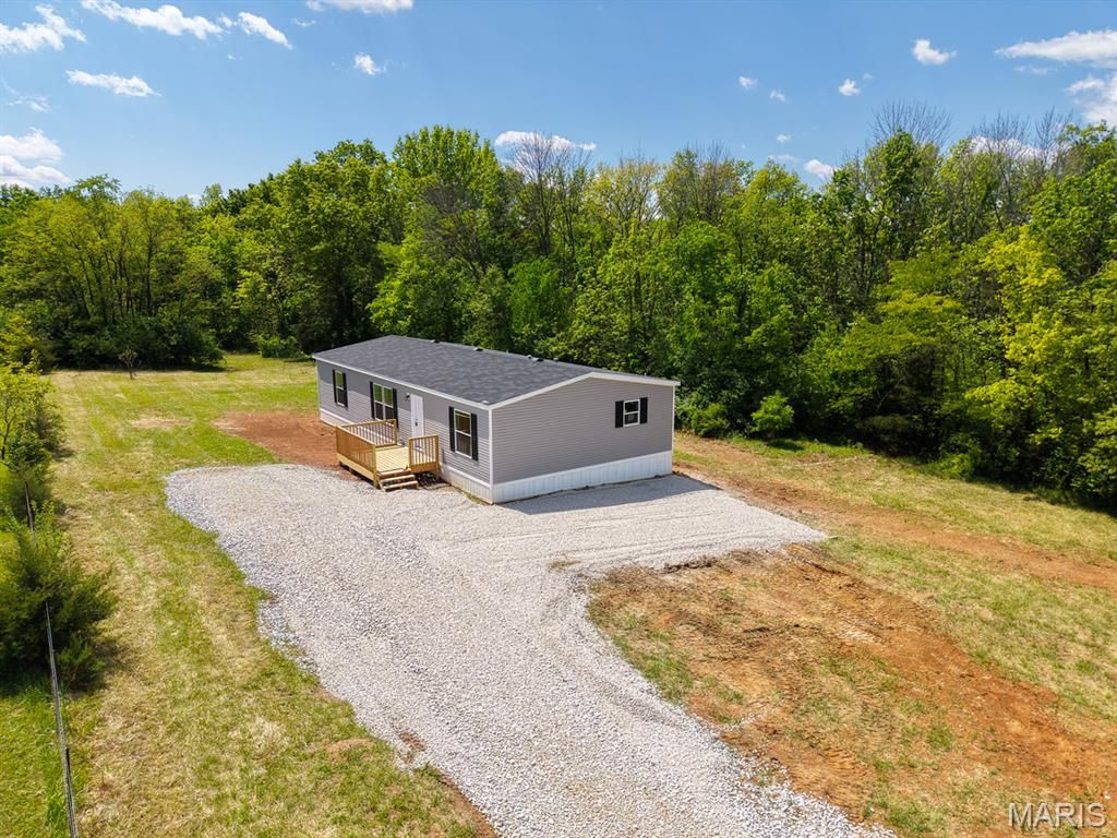 Photo of 3134 Creek Road, Moscow Mills, MO 63362 (MLS # 26024019)