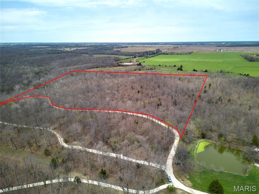 Don't miss out on this beautiful 27 acres of land mostly wooded. You could clear out a site to build a beautiful home or just keep it for recreational use, perfect for turkey and deer hunting. There is a rock pad for a camper to be parked on. 

Red line approximate outline of property, not an actual survey.