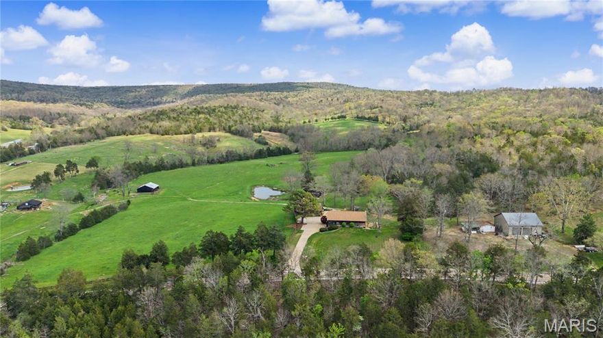 Rarely does a property combine such "boots-on-the-ground" utility with an immaculate, high-standard residence. Situated directly across from the Black River in Black, Missouri, this 109+/- acre estate is a masterclass in rustic elegance and functional ranching. At the heart of the rugged estate is an immaculate 1,200 +/- sq. ft. furnished home featuring 3 bedrooms and 2 bathrooms. The home has a wonderful two-car garage, topped with a fully covered deck and porch—the ultimate spot to enjoy panoramic views of the property. The entrance is marked by a gated wooden fence and a clean concrete driveway, ensuring privacy and curb appeal from the moment you arrive. A beautiful rugged retreat that offers elite hunting, rotational grazing, herd management, and nearby river access.


This mostly furnished property is a dream for hobbyists, ranchers, outdoor enthusiasts, or business owners. It includes a 30’ x 40’+/-  three-car garage/shop, with an Attached Lean-to: An additional 30’ x 40’ +/- covered space for easy-access & storage, Equipment (machine) Shed: A massive 40’ x 50’ +/- structure perfect for tractors and heavy machinery, and a Hay Barn that Includes an attached corral, ready for livestock operations. With ample acres of timber, a host of acreage for pasture and established cross fencing for livestock, this land is turnkey for cattle or horses. Hunters and nature lovers will appreciate the dedicated shooting house in the back pasture, ideally positioned for Missouri’s prime deer seasons. Additionally, this farmstead estate is just across the street from the Black River, providing world-class river access, gravel bar, and floating opportunities just seconds away. Whether you're looking for a working ranch, a hunting retreat, or a quiet Ozark farmstead, this Black, Missouri estate delivers it all.


This isn't just land; it's a functioning ecosystem for the hunter and rancher:
From the gated and wooden fenced entry to the rugged timber in the back, every inch of this property has been handled with care. It is a turnkey sanctuary for those who value the rugged Missouri lifestyle without sacrificing quality. Nearby are recreational landmarks like Taum Sauk Mountain State Park, Mark Twain National Forest, and the popular Johnson Shut-Ins. Rarely does a property of this caliber come to market as a complete, turnkey package. This estate transitions seamlessly from an Ozark retreat to a working ranch from day one. Whether you’re looking for a weekend hunting headquarters or a permanent homestead, this property is refined, rugged, and ready for you. This property is a rare find in the Black, MO area—offering the unique utility required by a working cattleman with the immaculate, move-in-ready standards of a quality hunting lodge.