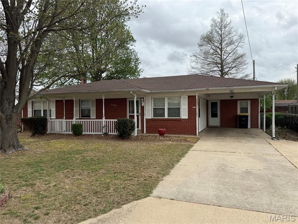 Photo of 1105 Peach Street, Kennett, MO 63857 (MLS # 26020707)