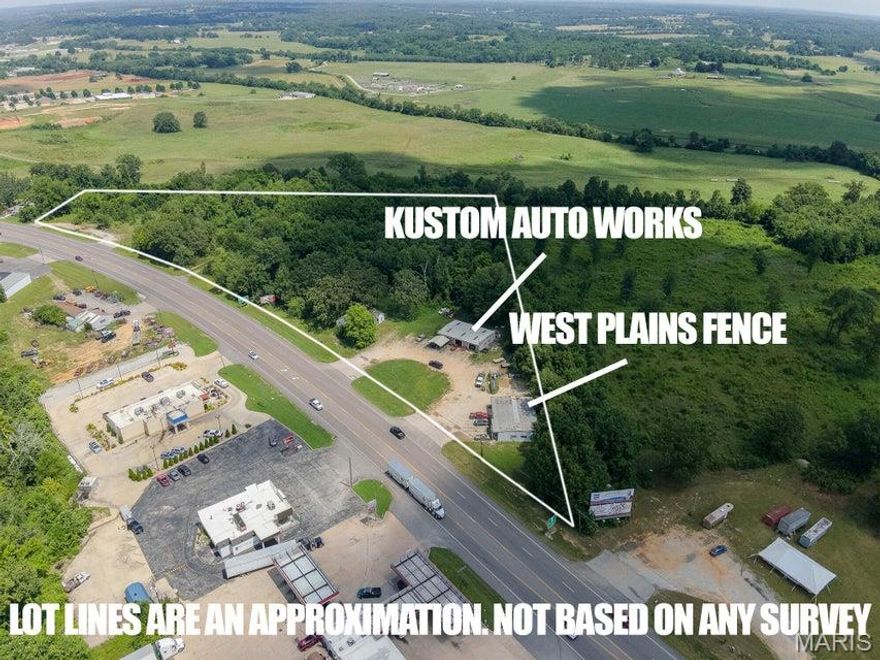 2 parcels - 5.5 acres w/vacant land, and 3 approaches.  and 6  acres with 2 metal buildings, a 40 x 60 metal commercial building.  2 State Approaches. One is fenced in. Established businesses currently occupy both buildings, paying a monthly rent of $600. each.  Room for expansion. (PARCELS CAN BE DIVIDED) Billboard income $300. yearly.  On a very busy  South US Hwy 63, with a total of  5 approaches from Hwy. 63 Owner will divide on Parcel lines or Splits off the land end with the buyer paying for the survey! Possible owner terms to a qualified buyer! Lots of potential and priced right to sell!