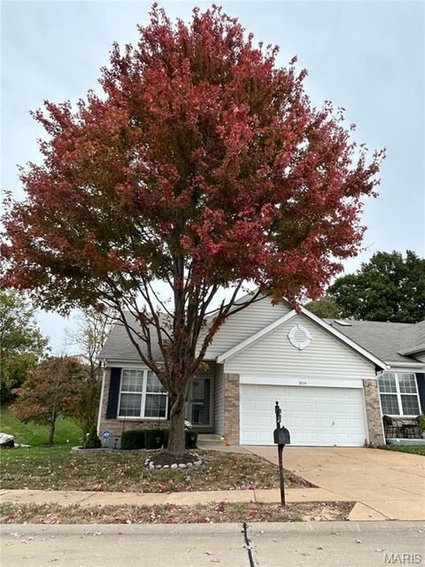Photo of 5014 Nicholas Ridge Drive, St Louis, MO 63129 (MLS # 26007808)