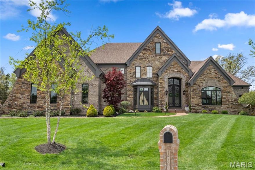 Gated estate in Lafayette Crossing, 6 bedrooms, 5 full & 1 half bath, with 8,050 square feet of luxurious living space. A grand foyer leads to a formal dining room & study. The great room features a stone fireplace & opens to a gourmet kitchen with 13-foot center island, 2 dishwashers, & high-end appliances. Main floor includes primary suite w an elegant ensuite bath & dual walk-in closets. Upstairs, find 4 spacious bedrooms, 3 full baths, a second large laundry room. The walk-out lower level is perfect for entertaining, featuring a lg family room, bedroom w an egress window, full bath, a brick & stone bar w granite countertops, an oven & dishwasher. This level also has a brick gas fireplace & leads to a patio with a hot tub. Outside, enjoy a custom saltwater pool with a waterfall & water slide, a covered screened porch with a stone gas fireplace, a walking trail, a creek, & firepit on a private 3-acre cul-de-sac lot with a 4-car garage. See supplements for a complete home update list. Additional Rooms: Mud Room