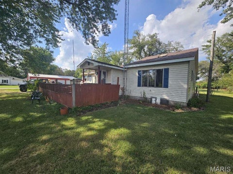 Photo of 303 W Reid Street, Holliday, MO 65258 (MLS # 26059219)