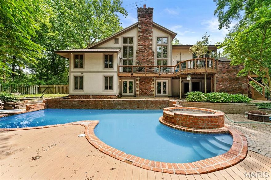 Set on a serene and secluded 4-acre lot that backs to mature trees, this 4-bedroom, 3 full and 2 half-bath home offers a rare opportunity to create your dream home in one of Ladue’s most desirable locations. With great bones and an abundance of natural light, this home is ready for a thoughtful renovation and personal touch.